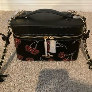 NWT coach black leather with cherry print makeup travel case